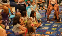 Caregivers and children at storytime