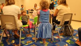 Caregivers and children at storytime
