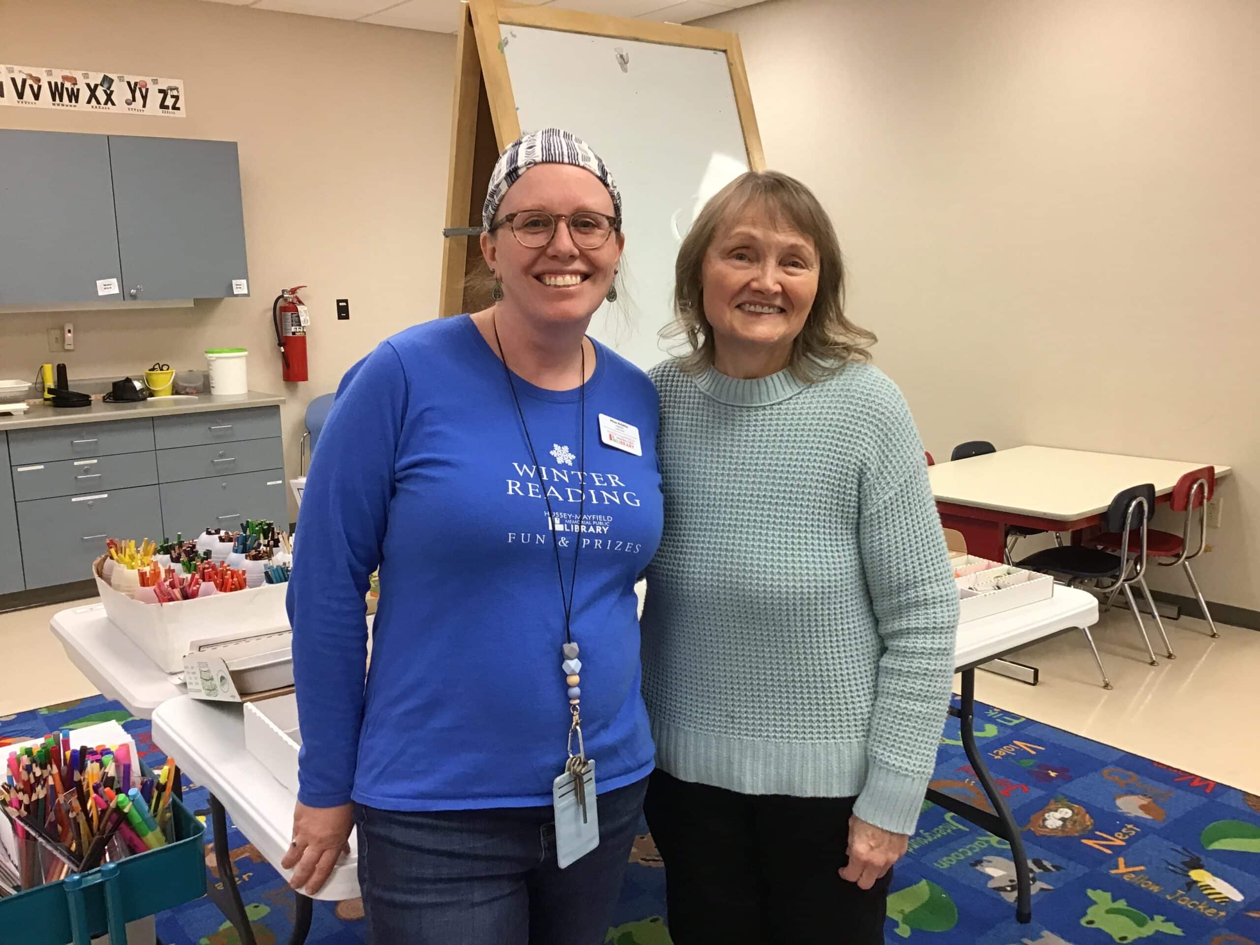 Youth Librarian Kristin Nalbone with volunteer art teacher Gwen Leslie