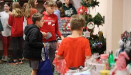 Children shopping at the Secret Snowflake Shop