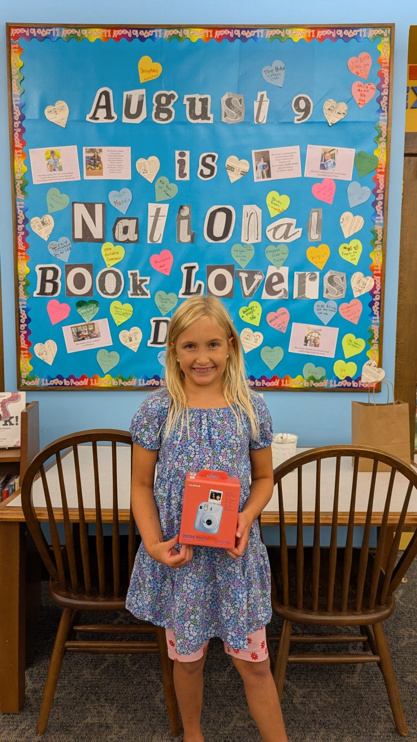 Girl standing with prize