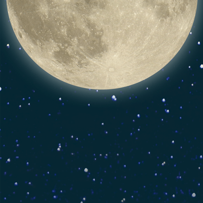 Image of the moon on a dark starry sky.